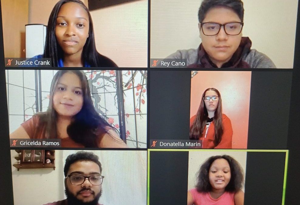 A screenshot of a video call shows six people in separate frames, each looking at the camera. Their names are displayed, highlighting a shared moment of educational empowerment and connection among participants.